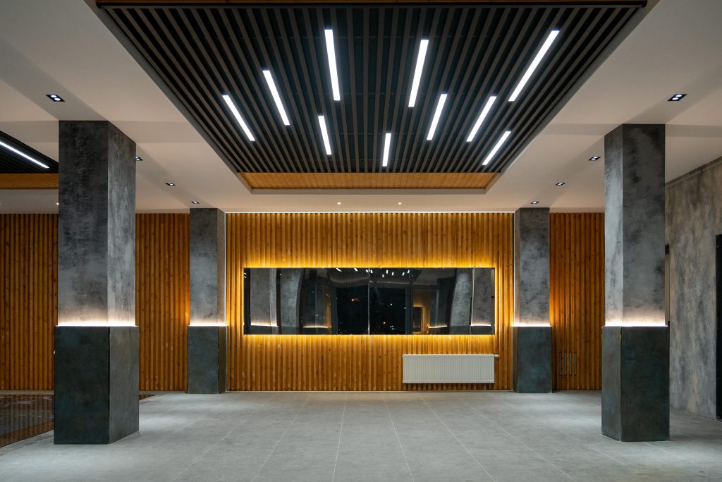 Sleek lobby interior featuring modern architecture and innovative lighting design.